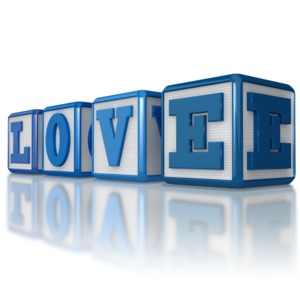 Baby blocks spelling out the word love.