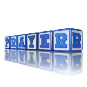 Baby blocks spelling out the word prayer.