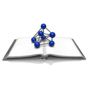A molecule design sitting on top of a book.