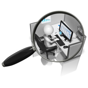 A stick figure types on a computer as he&#039;s observed under a magnifying glass. This clip-art can represent being micromanaged.