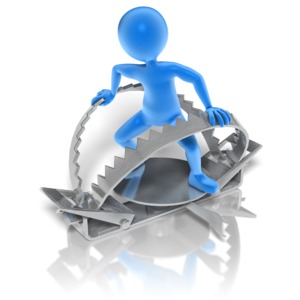 A stick figures fights from getting stuck in a steel trap. This clip-art can represent someone avoiding getting trapped.