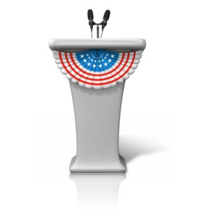 An image of a podium with a patriotic banner.