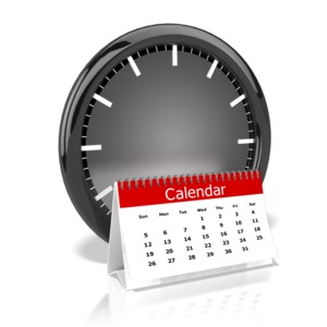 A clock is shown behind a calendar
