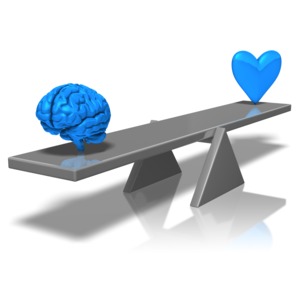 A seesaw with a heart on one end and a brain on another. This clip-art can represent someone choosing between the heart or the mind.