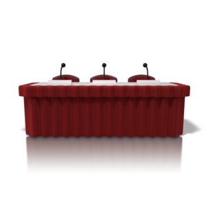 A conference table has been prepared for a panel discussion or group presentation.