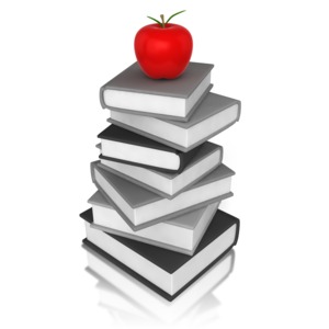 A stack of books are shown with an apple on top.