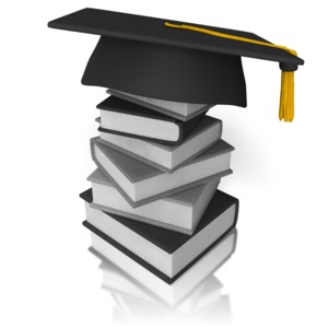 A stack of books with a graduation cap on top