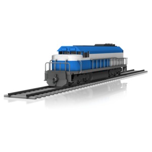 A lone train engine on a railroad track.