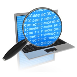 A magnifying glass enlarges binary code on a computer screen. This clip-art can represent having your computer inspected.
