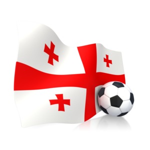 This clip art image shows a Georgian flag with a soccer ball sitting next to it.  