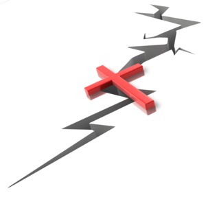 An image of a cross bridging the gap with a large crack below.