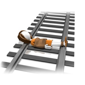 A woman is tied with rope laying on train tracks.