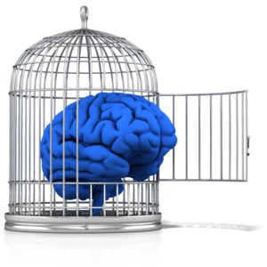 This clip art image shows a brain emerging from an open cage.