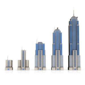 This clip art image shows a business building starting out small and growing into a giant skyscraper.