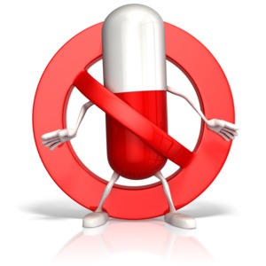 This clip art image shows a drug pill stuck behind a prohibited symbol.