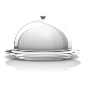 An image of a platter with the lid covering the dish.