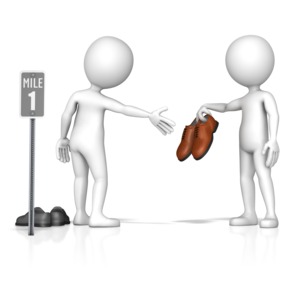 One figure hands another their shoes to put on and walk go a mile.  Displays the idiom &quot;walk a mile in my shoes&quot;.