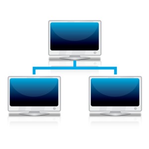 An image of three computer connected together.