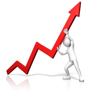 A stick figure pushes a chart arrow upward. This clip-art can represent the effort to raise profits.