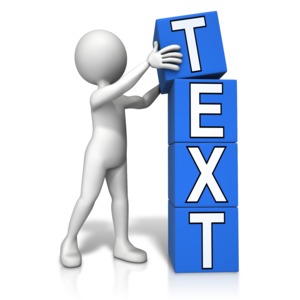 An image of a figure setting a block on top of the stack to make a set of four with custom letters on each block.