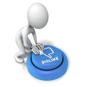An image of a stick figure pushing a large thumbs down &quot;DISLIKE&quot; button.