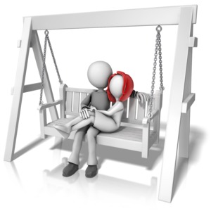 An image of a couple sitting on a swing together.