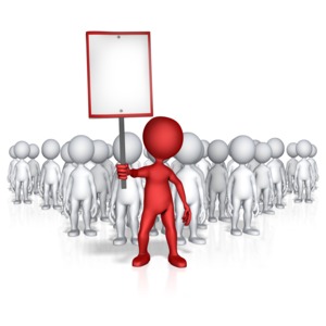 This clip art image shows a standout figure holding a sign with bunch of figures standing behind.