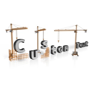 An image of custom text being built by cranes.