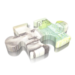 A puzzle piece with the Canadian dollar on the face of the piece.