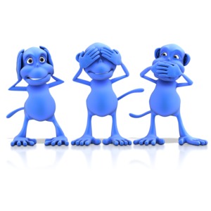 Three monkeys pose for the saying: Hear no evil, see no evil, speak no evil.