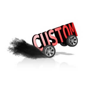Custom Text is shown on four wheels doing a burnout that creates a smoke cloud behind the text.