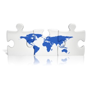 An image of a three piece puzzle with a globe map spanning across the pieces.