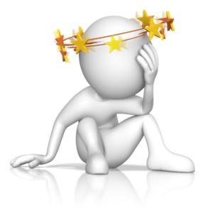 A figure sits on the ground holding head as stars circle above.