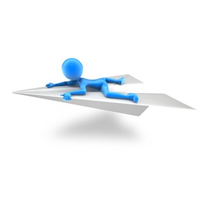 An image of a figure riding on top of a paper airplane.