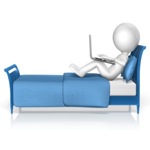 A stick figure sits in bed and types on his notebook computer.