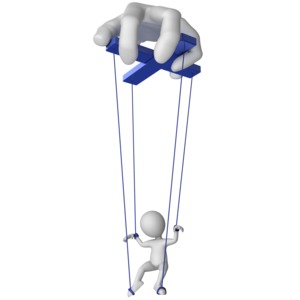 This clip art image shows a large hand controlling a small figure with puppet strings.