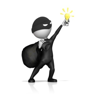A thief stealing an idea light bulb.