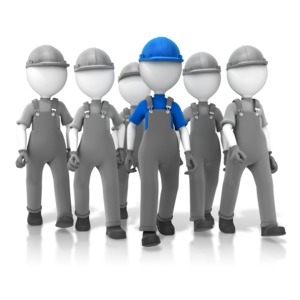 An image of a construction group with a leader out front.