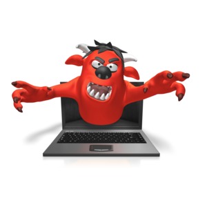 An image of a monster coming out of a computer laptop screen.