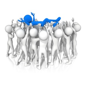 An image of a figure crowd surfing in a group of people.