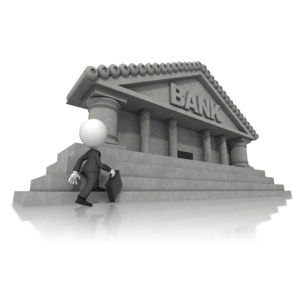 An image of a business stick figure walking up the stairs of a bank.