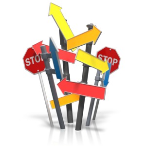 An image of a cluster of arrows and signs pointing in all directions.