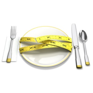 This clip art image shows a tape measure around a dinner plate.
