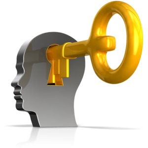 This clip art image shows a head with a keyhole and a key being inserted into it.