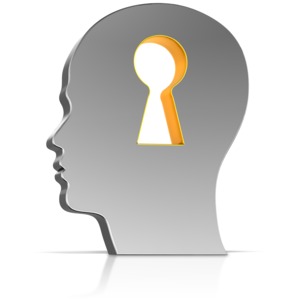 This clip art image shows a head with a keyhole in it.