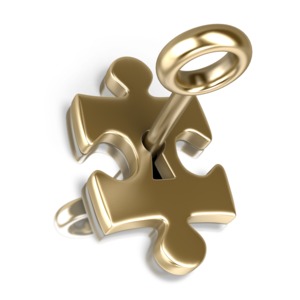 An image of a key turned unlocking a puzzle piece.