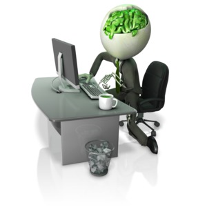 This clip art image shows a business zombie figure working on a computer at a office desk.