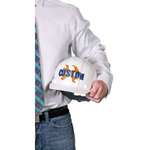 A foreman holds a white hard hat with you custom design on it.