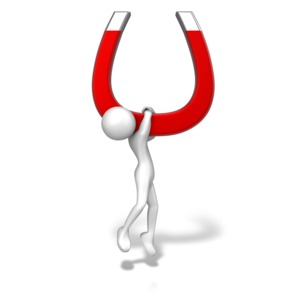 An image of a stick figure hanging from a magnet