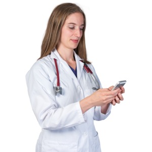 A closeup image of a female doctor or nurse texting on her phone.